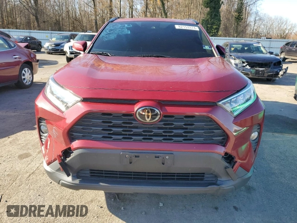 2019 Toyota RAV4 XLE with VIN JTMP1RFV2KD039171, listed as a Copart auction lot 82153374 with 64,482 mi miles and Salvage Title. Bid and sale history available at carsss.com. Image 5.