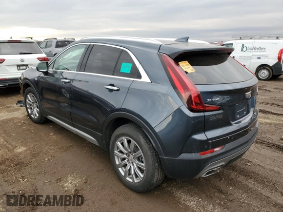 2020 Cadillac XT4 FWD Premium Luxury z VIN 1GYFZCR43LF050118, wystawiony jako Copart lot #49529635 z przebiegiem 93 290 mil mil oraz Tytuł czysty. Historia ofert i sprzedaży dostępna na DreamBid. Obrazek 2.