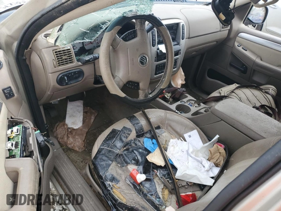 2005 Mercury Mountaineer Convenience z VIN 4M2ZU86W35UJ00044, wystawiony jako Copart lot #57158275 z przebiegiem Nie podano mil oraz Szkoda całkowita • Salvage title. Historia ofert i sprzedaży dostępna na DreamBid. Obrazek 8.