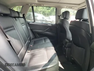 2012 BMW X5 35i z VIN 5UXZV4C55CL753810, wystawiony jako Copart lot #62405565 z przebiegiem 178 504 mil mil oraz Szkoda całkowita • Salvage title. Historia ofert i sprzedaży dostępna na DreamBid. Obrazek 11.