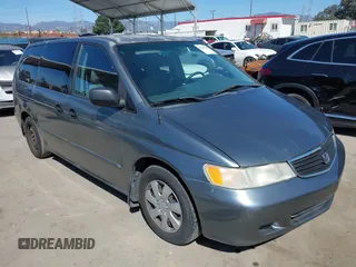 2000 Honda Odyssey LX z VIN 2HKRL1853YH517134, wystawiony jako IAAI lot #41836365 z przebiegiem 150 843 mil mil oraz . Historia ofert i sprzedaży dostępna na DreamBid. Obrazek 1.