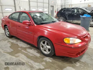 1999 Pontiac Grand Am GT1 with VIN 1G2NW52E7XM848894, listed as a Copart auction lot 43809495 with 117,059 mi miles and Salvage Title. Bid and sale history available at carsss.com. Image 4.