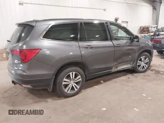 2018 Honda Pilot EX-L with VIN 5FNYF6H52JB052141, listed as a IAAI auction lot 41452260 with 113,382 mi miles. Bid and sale history available at carsss.com. Image 4.