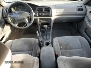 1999 Mazda 626 ES with VIN 1YVGF22C1X5835600, listed as a Copart auction lot 84965004 with 217,352 mi miles and Salvage Title. Bid and sale history available at carsss.com. Image 8.