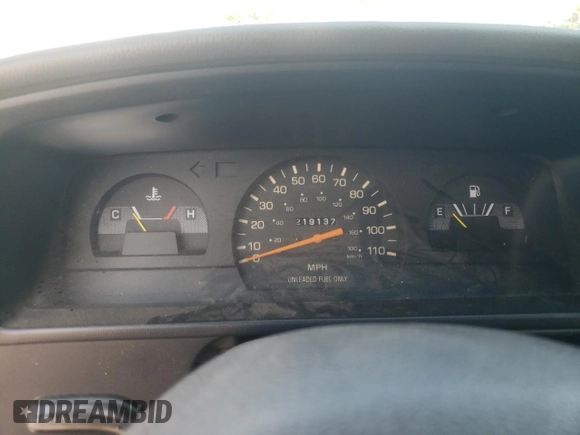 1993 Toyota Pickup DLX z VIN JT4RN93P6P5087700, wystawiony jako Copart lot #72069284 z przebiegiem 219 137 mil mil oraz Szkoda całkowita • Salvage title. Historia ofert i sprzedaży dostępna na DreamBid. Obrazek 9.
