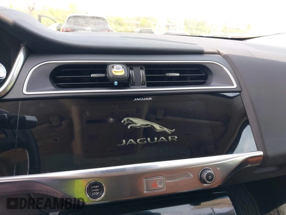 2020 Jaguar I-Pace SE with VIN SADHC2S1XL1F80407, listed as a IAAI auction lot 42033260 with 46,738 mi miles and . Bid and sale history available at DreamBid. Image 19.