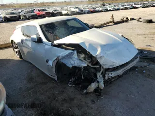 2014 Nissan 370Z Touring with VIN JN1AZ4EH5EM635783, listed as a Copart auction lot 85475214 with 107,712 mi miles and Salvage Title. Bid and sale history available at carsss.com. Image 4.
