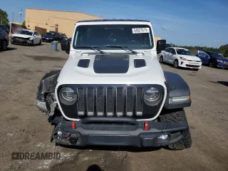 2020 Jeep Wrangler Unlimited Recon with VIN 1C4HJXFN2LW253771, listed as a Copart auction lot 54837675 with 98,935 mi miles and Salvage title. Bid and sale history available at DreamBid. Image 5.