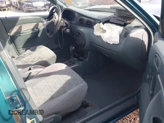 1997 Ford Escort LX with VIN 3FALP15P1VR169817, listed as a IAAI auction lot 42094673 with 111,762 mi miles. Bid and sale history available at carsss.com. Image 5.