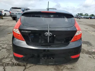 2012 Hyundai Accent SE with VIN KMHCU5AE1CU019559, listed as a Copart auction lot 65235685 with 119,556 mi miles and Salvage title. Bid and sale history available at DreamBid. Image 6.