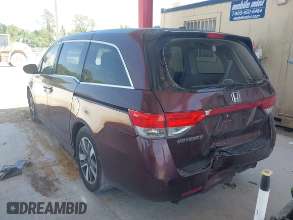 2014 Honda Odyssey Touring with VIN 5FNRL5H90EB080889, listed as a IAAI auction lot 42085305 with 123,286 mi miles and . Bid and sale history available at carsss.com. Image 3.