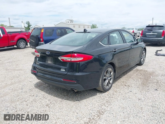 2020 Ford Fusion SEL z VIN 3FA6P0CD5LR131097, wystawiony jako IAAI lot #42218517 z przebiegiem 94 394 mil mil oraz . Historia ofert i sprzedaży dostępna na DreamBid. Obrazek 4.
