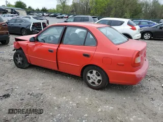 2001 Hyundai Accent GL with VIN KMHCG45C81U219104, listed as a Copart auction lot 51597985 with 157,597 mi miles and Salvage Title. Bid and sale history available at carsss.com. Image 2.