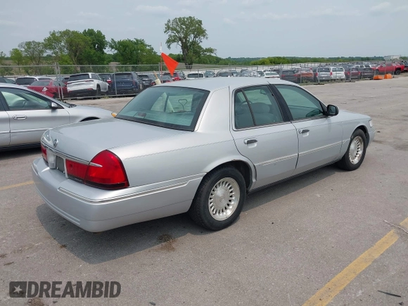 1999 Mercury Grand Marquis LS z VIN 2MEFM75W7XX659031, wystawiony jako IAAI lot #42362387 z przebiegiem 140 067 mil mil oraz . Historia ofert i sprzedaży dostępna na DreamBid. Obrazek 4.