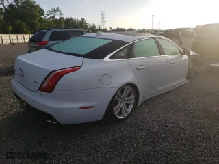 2018 Jaguar XJ with VIN SAJWA2G76J8W13668, listed as a Copart auction lot 59424963 with 27,983 mi miles. Bid and sale history available at carsss.com. Image 3.
