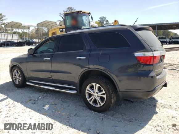 2013 Dodge Durango Crew with VIN 1C4RDHDG4DC698800, listed as a Copart auction lot 51002525 with 156,774 mi miles and Salvage Title. Bid and sale history available at carsss.com. Image 2.