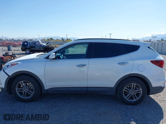 2017 Hyundai Santa Fe 2.4L z VIN 5NMZU3LB1HH045714, wystawiony jako IAAI lot #41949139 z przebiegiem 151 799 mil mil oraz . Historia ofert i sprzedaży dostępna na DreamBid. Obrazek 14.