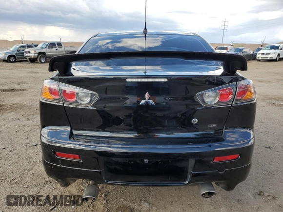 2009 Mitsubishi Lancer with VIN JA3AV66V39U039262, listed as a Copart auction lot 69342714 with 86,000 mi miles and Salvage Title. Bid and sale history available at DreamBid. Image 6.