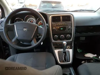2010 Dodge Caliber Mainstreet z VIN 1B3CB3HAXAD551716, wystawiony jako Copart lot #77349503 z przebiegiem 144 209 mil mil oraz Tytuł czysty. Historia ofert i sprzedaży dostępna na DreamBid. Obrazek 8.