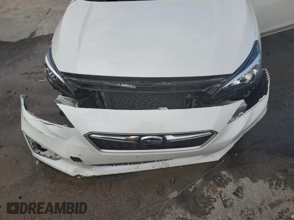 2019 Subaru Impreza Premium z VIN 4S3GTAD62K3753556, wystawiony jako Copart lot #63009014 z przebiegiem Nie podano mil oraz Szkoda całkowita • Salvage title. Historia ofert i sprzedaży dostępna na DreamBid. Obrazek 12.