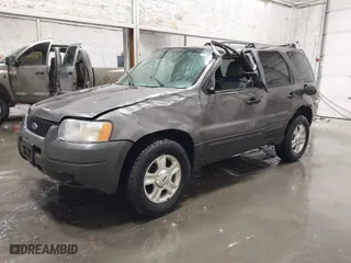 2004 Ford Escape XLT with VIN 1FMCU93174KB67570, listed as a IAAI auction lot 41228124 with 160,176 mi miles. Bid and sale history available at carsss.com. Image 2.