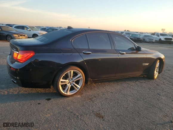 2011 BMW 7 Series 750i with VIN WBAKA8C57BCY36575, listed as a Copart auction lot 77526024 with 120,087 mi miles and Clean Title. Bid and sale history available at carsss.com. Image 3.