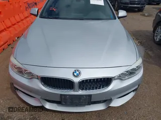 2015 BMW 4 Series 428i xDrive with VIN WBA4C9C50FD330482, listed as a IAAI auction lot 42116547 with 192,739 mi miles and . Bid and sale history available at DreamBid. Image 12.