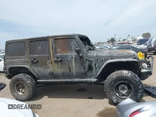 2016 Jeep Wrangler Unlimited Sahara z VIN 1C4HJWEG4GL261147, wystawiony jako IAAI lot #42239252 z przebiegiem 69 604 mil mil oraz . Historia ofert i sprzedaży dostępna na DreamBid. Obrazek 13.