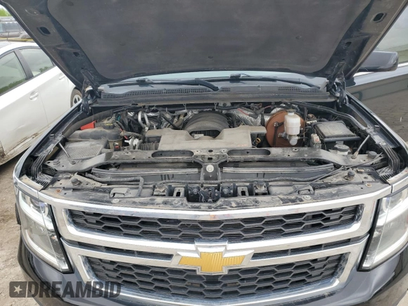 2015 Chevrolet Tahoe z VIN 1GNSK3EC1FR686729, wystawiony jako Copart lot #55844105 z przebiegiem 147 582 mil mil oraz Szkoda całkowita • Salvage title. Historia ofert i sprzedaży dostępna na DreamBid. Obrazek 11.