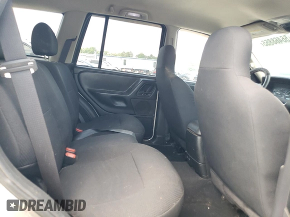 2004 Jeep Grand Cherokee Laredo z VIN 1J4GW48S84C177274, wystawiony jako Copart lot #56468855 z przebiegiem 236 014 mil mil oraz Szkoda całkowita • Salvage title. Historia ofert i sprzedaży dostępna na DreamBid. Obrazek 11.