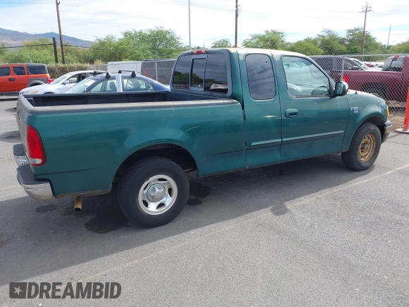 2000 Ford F-150 XL with VIN 2FTRX17W3YCA66727, listed as a IAAI auction lot 42639201 with 42,094 mi miles and . Bid and sale history available at DreamBid. Image 4.