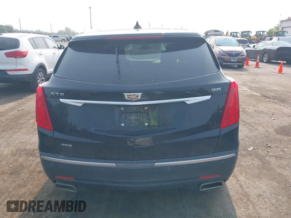 2018 Cadillac XT5 Luxury AWD with VIN 1GYKNDRSXJZ247863, listed as a IAAI auction lot 42392404 with 96,629 mi miles and . Bid and sale history available at DreamBid. Image 16.