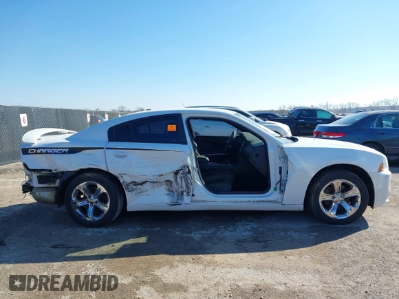 2013 Dodge Charger SE with VIN 2C3CDXBG3DH696590, listed as a IAAI auction lot 41425505 with 234,105 mi miles and . Bid and sale history available at carsss.com. Image 13.