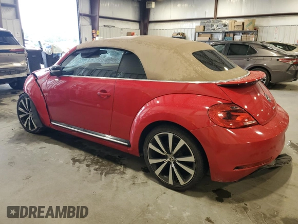 2015 Volkswagen Beetle with VIN 3VW7S7AT1FM822318, listed as a Copart auction lot 71398644 with 73,421 mi miles and Salvage Title. Bid and sale history available at DreamBid. Image 2.