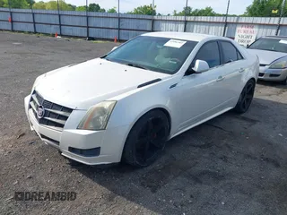 2010 Cadillac CTS Luxury with VIN 1G6DE5EG9A0140090, listed as a IAAI auction lot 42086562 with 230,280 mi miles. Bid and sale history available at carsss.com. Image 2.