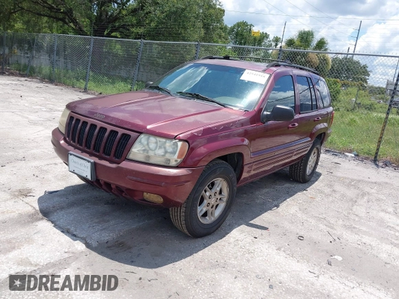 2000 Jeep Grand Cherokee Laredo with VIN 1J4G258S4YC381030, listed as a IAAI auction lot 42541918 with 306,934 mi miles and . Bid and sale history available at DreamBid. Image 2.