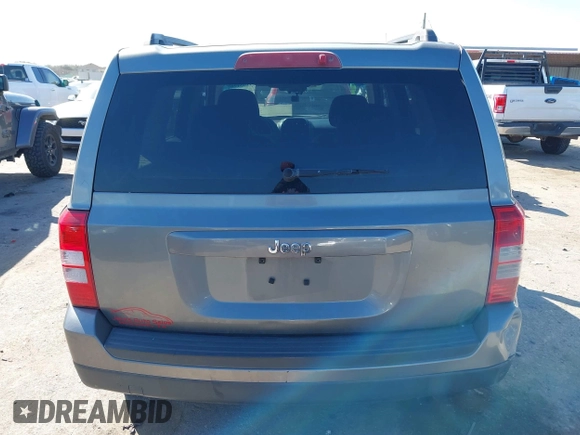 2013 Jeep Patriot Sport with VIN 1C4NJPBA0DD245736, listed as a IAAI auction lot 41651282 with 227,456 mi miles. Bid and sale history available at carsss.com. Image 16.