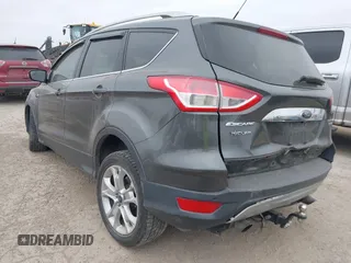 2016 Ford Escape Titanium with VIN 1FMCU0J9XGUC58149, listed as a IAAI auction lot 41739005 with 111,594 mi miles. Bid and sale history available at carsss.com. Image 3.