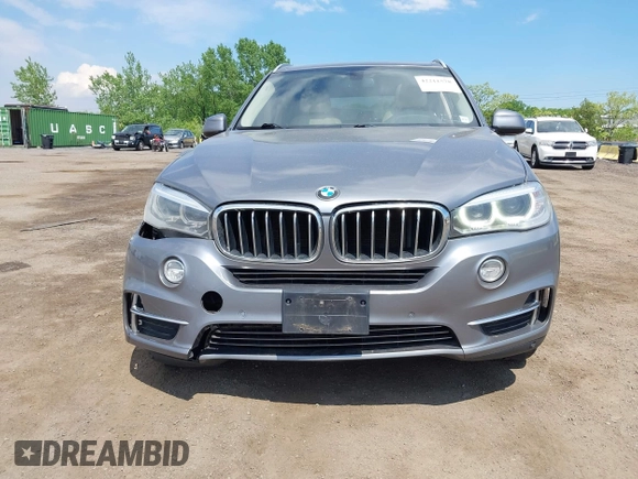 2014 BMW X5 xDrive35i z VIN 5UXKR0C5XE0K43570, wystawiony jako IAAI lot #42211578 z przebiegiem 260 817 mil mil oraz . Historia ofert i sprzedaży dostępna na DreamBid. Obrazek 12.