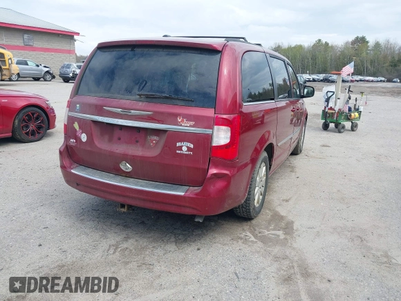 2015 Chrysler Town & Country Touring with VIN 2C4RC1BG6FR513993, listed as a IAAI auction lot 42189211 with 175,538 mi miles. Bid and sale history available at carsss.com. Image 4.