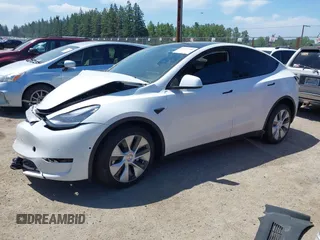 2022 Tesla Model Y Long Range z VIN 7SAYGDEE9NF509655, wystawiony jako IAAI lot #42433796 z przebiegiem 46 936 mil mil oraz . Historia ofert i sprzedaży dostępna na DreamBid. Obrazek 23.