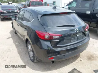 2014 Mazda 3 i Grand Touring z VIN JM1BM1M75E1151329, wystawiony jako IAAI lot #42248334 z przebiegiem 138 748 mil mil oraz . Historia ofert i sprzedaży dostępna na DreamBid. Obrazek 3.