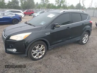 2014 Ford Escape Titanium with VIN 1FMCU9J90EUC24898, listed as a IAAI auction lot 42166523 with 152,464 mi miles and . Bid and sale history available at DreamBid. Image 17.