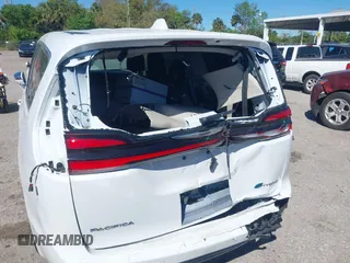2022 Chrysler Pacifica Hybrid Limited with VIN 2C4RC1S74NR112960, listed as a IAAI auction lot 41584818 with 22,040 mi miles and . Bid and sale history available at DreamBid. Image 6.