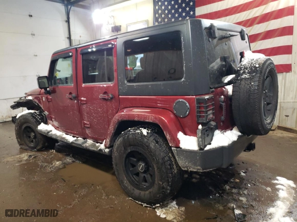 2013 Jeep Wrangler Unlimited Freedom Edition with VIN 1C4BJWDG5DL579913, listed as a Copart auction lot 42807725 with 151,081 mi miles and Salvage Title. Bid and sale history available at carsss.com. Image 2.