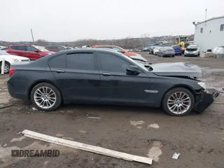 2015 BMW 7 Series 750i xDrive with VIN WBAYB6C59FD965820, listed as a IAAI auction lot 41558215 with 142,617 mi miles. Bid and sale history available at carsss.com. Image 12.