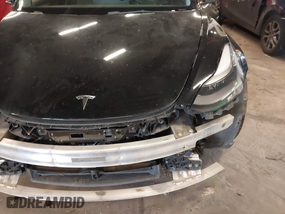 2022 Tesla Model 3 with VIN 5YJ3E1EA4NF187113, listed as a IAAI auction lot 41712331 with 81,879 mi miles and . Bid and sale history available at DreamBid. Image 20.