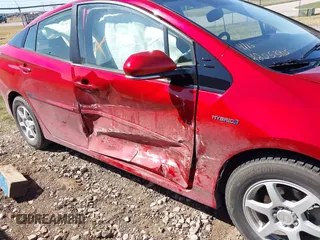 2016 Toyota Prius Four z VIN JTDKARFU0G3502097, wystawiony jako IAAI lot #42053915 z przebiegiem 102 252 mil mil oraz . Historia ofert i sprzedaży dostępna na DreamBid. Obrazek 6.
