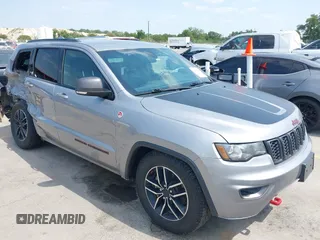 2019 Jeep Grand Cherokee Trailhawk with VIN 1C4RJFLG3KC771909, listed as a IAAI auction lot 42045267 with 108,084 mi miles and . Bid and sale history available at DreamBid. Image 1.
