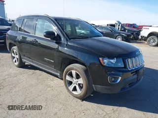 2016 Jeep Compass High Altitude Edition with VIN 1C4NJCEA2GD761735, listed as a IAAI auction lot 41404892 with 114,129 mi miles. Bid and sale history available at carsss.com. Image 1.